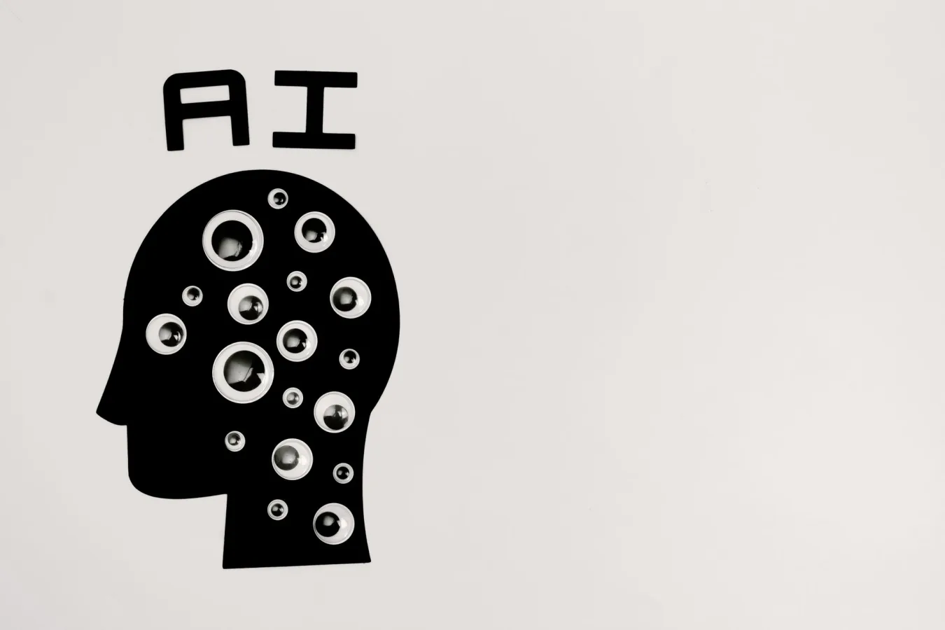 Abstract illustration of AI with silhouette head full of eyes, symbolizing observation and